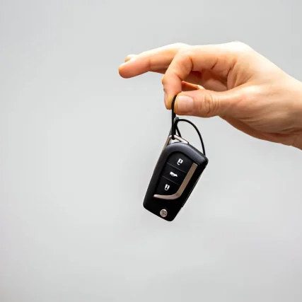 Technician Unlocking Car Door Auto Locksmith unlocking a vehicle door quickly and safely